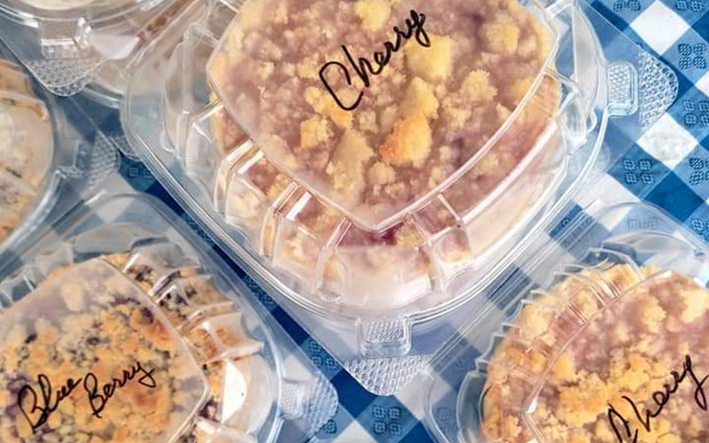 Image of The Pie Guy's table at one of the farmers' markets.